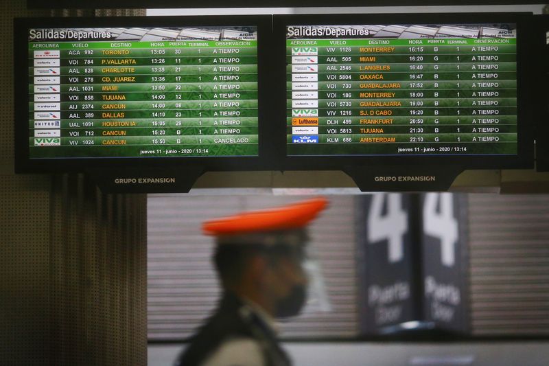&copy; Reuters. FILE PHOTO: Screens show flight information at the almost empty Benito Juarez international airport, as the spread of the coronavirus disease (COVID-19) continues in Mexico City, Mexico, June 11, 2020. REUTERS/Edgard Garrido