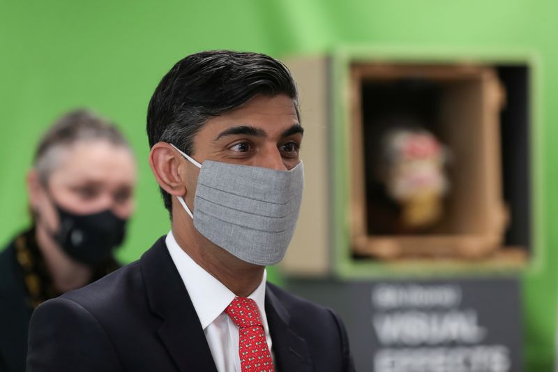 &copy; Reuters. FILE PHOTO: Britain's Chancellor of the Exchequer Rishi Sunak stands near a mask prop during a local election campaign visit to Northern School of Art in Hartlepool, Britain, April 30, 2021. REUTERS/Lee Smith/Pool