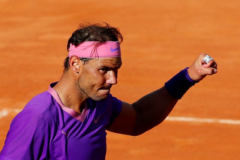 &copy; Reuters. Rafael Nadal avait un break de retard dans chacune des deux dernières manches./Photo prise le 13 mai 2021/REUTERS/Guglielmo Mangiapane