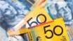 Aussie at two-year highs vs. dollar after RBA minutes