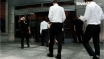 Wall St edges lower as earnings flow continues apace